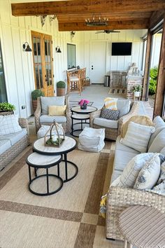 a living room filled with lots of furniture