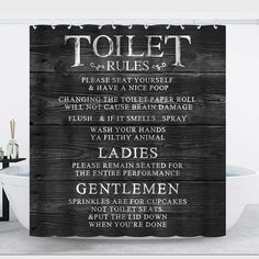 a black and white shower curtain with the rules for toilets