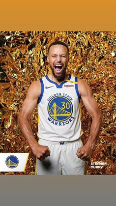 the golden state warriors basketball player is posing for a photo in front of gold foil