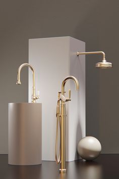 an assortment of bathroom fixtures including a soap dispenser, faucet and lamp