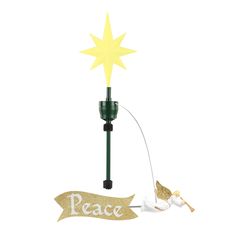 a light up christmas decoration with a star on top and a sign that says peace