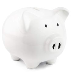 a white piggy bank sitting on top of a table