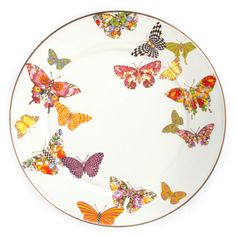 a plate with many colorful butterflies on it