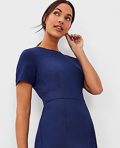 Elevate your wardrobe with the Ann Taylor Short Sleeve Sheath Dress in Bi-Stretch, a perfect blend of style and comfort. This dress is designed to keep you looking polished from morning to evening, thanks to its refined four-way stretch fabric that flatters without sacrificing comfort.

- **Size:** 16 Regular
- **Color:** Pure Sapphire
- **Material:** 66% Polyester, 28% Rayon, 6% Spandex; Lining: 100% Polyester
- **Fit:** Tailored
- **Length:** Hits at knee, 24" from natural waist
- **Neckline:* Business Dinner Outfit, Workwear Inspiration, Sapphire Dress, Business Dinner, Ann Taylor Petite, Knitted Suit, Dinner Outfit, Petite Shorts, Professional Attire