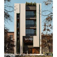 an apartment building with balconies on the second floor