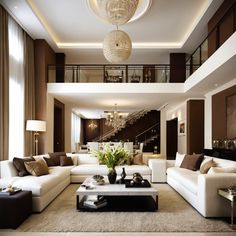 a living room filled with white couches and brown walls next to a stair case