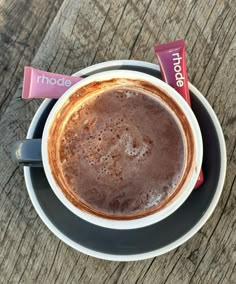 a cup of hot chocolate sitting on top of a saucer