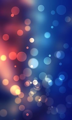 an abstract blurry background with blue and red lights