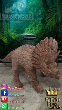 an image of a toy dinosaur in the jungle