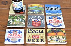 six coasters with different types of beer on them sitting on top of a wooden table