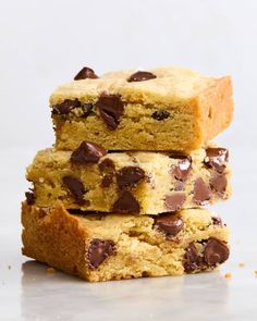 three chocolate chip cookie bars stacked on top of each other