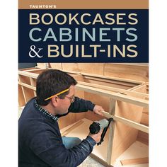 a man is working on cabinets and built insulated walls with the words bookcases, cabinets & built insulated walls