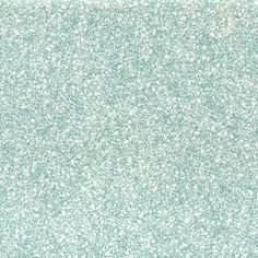 a blue and white background with small speckles