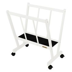 a white and black cart with wheels on the bottom, holding a small shelf for storing items