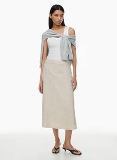 MERIT LINEN SKIRT | Aritzia Linen Lined Skirt For Workwear, Linen Midi Skirt For Work, Spring Linen Maxi Skirt For Work, Spring Workwear Linen Maxi Skirt, Beige Linen Skirt For Daywear, Linen Maxi Skirt For Daywear, Summer Linen Maxi Skirt For Work, Linen Skirt For Workwear, Neutral Linen Summer Skirt