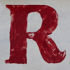 the letter p is painted red and white