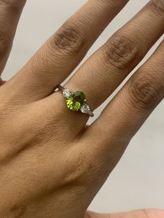 Peridot Trilogy Engagement ring