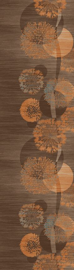 an orange and brown rug with flowers on it