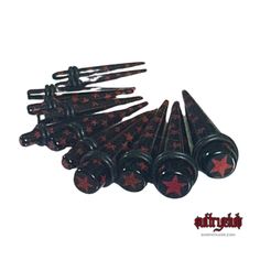 a bunch of black and red hair pins on a white background with the words,'star