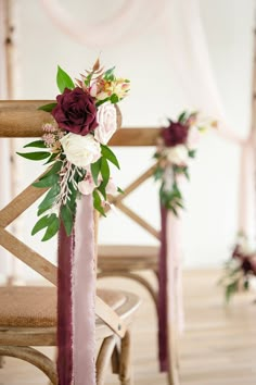 the chairs are decorated with flowers and ribbons