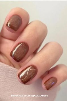 This manicure, featuring an elegant brown color with glitter and a shiny finish. The nails have a simple design that highlights their natural shape and lines.   #Brown NailColors #FallNails #FallNailart #FallNaildesign #Thanksgiving #Thanksgivingnails #novembernails #novembernaildesign #novembernailcolors #thanksgivingnailsdesignfall #thanksgivingnailscolor #thanksgivingnailsfall #fallthanksgivingnails #thanksgivingnailsshort #cutethanksgivingnailssimple #thanksgivingnailsacrylic #simplethanksgivingnails #thanksgivingnailsfall #diythanksgivingnails #nailart Fallnails Autumn 2024, Nails Design Thanksgiving, Fall To Christmas Nails, Thanksgiving Nails Square Short, Thanksgiving Nails Dip Powder, Short Nail Fall Designs, November Nails 2024, Fall Holiday Nails, Fall Sns Nail Colors