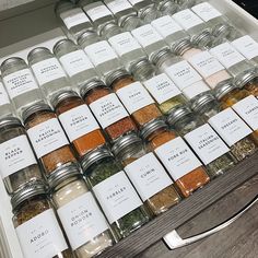 an assortment of spices and seasonings in glass jars