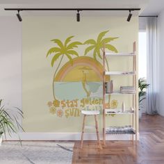 a wall mural with palm trees and a surfer on the beach