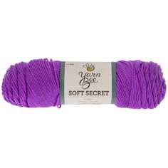 yarn ball in purple color on white background