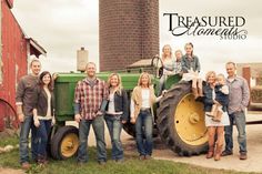 a group of people standing in front of a tractor with the words, treasures moments studio