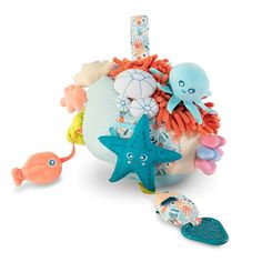 an octopus, starfish, and other sea creatures are in this toy set on a white background