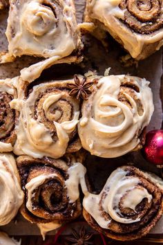 cinnamon rolls with icing and star anise on top