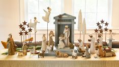 a nativity scene with figurines on a table