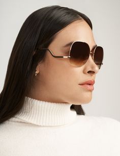 Gold-tone square-frame sunglasses with vintage drop temple and gradient lenses deliver an all-occasion style. Hard case included. Measurements: 60-16-135 Square Frame Sunglasses, Rose Gold Sunglasses, Sunglasses & Glasses, Square Frame, Round Sunglass Women, Sunglass Frames, Square Frames, Anne Klein, Hard Case