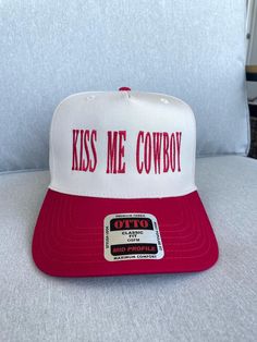 Kiss Me Cowboy Hat - Light Tan/Neutral & Red Pairs well with a cowboy 😉 These customized hats are great for summer, concerts, gifts, vacations, and more! Unisex fit, OSFM, Adjustable SnapBack. Various color options, message us for any questions! Western Bf Gifts, Cute Trucker Hats For Women, Western Christmas Gifts, Trucker Hat Aesthetic, Cute Trucker Hats, Trucker Hats, Funny Trucker Hat, Boat Hat, Country Hats