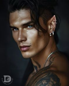 a man with tattoos and piercings on his chest is looking at the camera while wearing ear rings