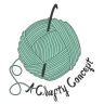 a green ball of yarn with the words happy county written on it and an knitting needle