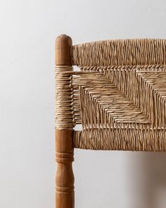 a close up of a chair made out of wicker