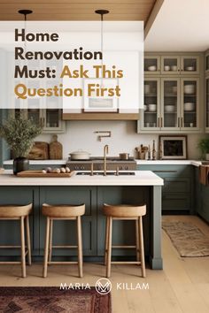 a kitchen with two stools in front of the sink and an island countertop