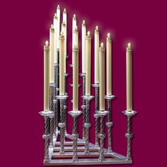 a menorah with many lit candles in it