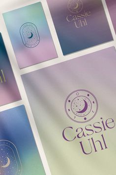 four different logos are shown on the same paper as they appear to be printed in purple, blue and green