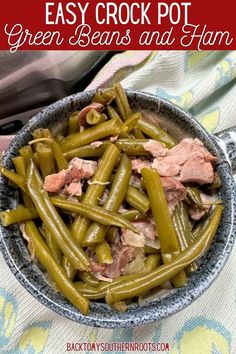 an easy crock pot green beans and ham recipe in a bowl on a table