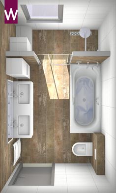 a bathroom with a toilet, sink and bathtub in the middle of it's floor plan