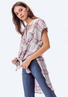 Short sleeve, plaid button-down tunic. Tie it up or wear it long! FINAL SALE Yarn dye plaid Relaxed fit Short cap sleeves Long tunic length Rounded shirttail hemline High side vents Round neckline Button front Double bust pockets 99% Cotton, 1% Spandex Model is 5'9, wearing a size S.Style: I-11596W-PSC-YD Plaid Tunic, Long Tunic, Tunic Length, Yarn Dyeing, Workout Shorts, Round Neckline, Cap Sleeves, Final Sale, Open Shoulder Tops