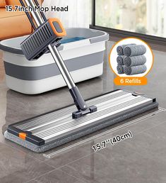 the floor mop is being used to clean tiles and tile floors with it's attachment