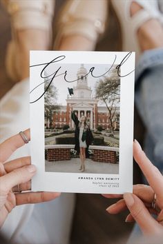 two people holding up a card with the words give on it and an image of a couple standing in front of a building