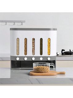 an image of a food dispenser that is on the counter