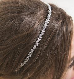 The perfect headband for a glamorous bridal look. This stunning accessory features the finest Cubic Zirconia crystals all individually wire-wrapped onto a headband frame. This headpiece looks great styled with a low chignon. This is a made-to-order item, ships out 10-15 business days after purchase (not including shipping delivery time). Expedite crafting time is available for an additional cost. Available in: 18K White Gold over base metal Cubic Zirconia crystals, bezel setting Wire wrapped ont Bridal Headbands, Leaf Headband, Leaf Headpiece, Wedding Hair Headband, Beads Design, Silver Headband, Crystal Headpiece, Bridal Fashion Jewelry, Bridal Updo