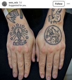 two hands that have tattoos on them