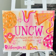 a sign that says uncw on it