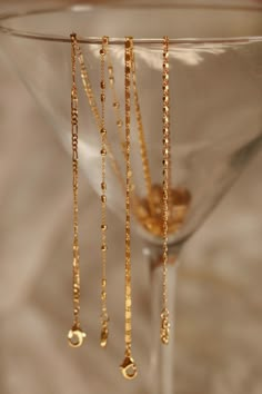 Details Oakland, Geneva, Alexandria, Nyrobi (left to right)Elegant stacking chains for the everyday minimalist. Made as a daily piece to elevate even the simplest of looks. ⁃ 14 Karat gold plated ⁃ 16” length +2” extender Clean Jewelry Aesthetic, New Years Jewelry Photography, Aesthetic Pictures Jewelry, Jewelry Product Shots Ideas Creative, Jewelry Pics Ideas, Photoshoot Ideas For Jewellery, Jewelry Branding Shoot, Permanent Jewelry Photography, Jewelry Small Business Aesthetic